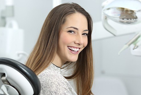 Smiling woman in dental chair