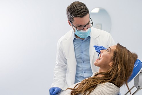 Patient talking to their dentist