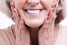 A closeup view of a senior woman’s dentures