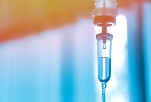 a closeup of an IV drip