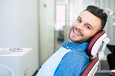 Patient in St. Joseph smiling in the dentist chair