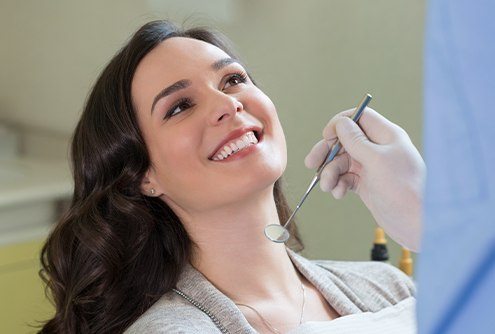 Smiling woman in dental chair