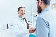 Man shaking hands with dentist