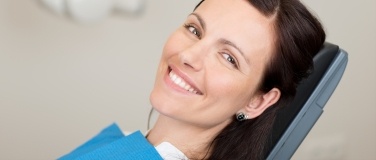 Smiling woman in dental chair