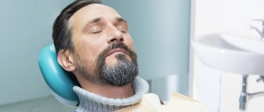 Relaxed man in dental chair