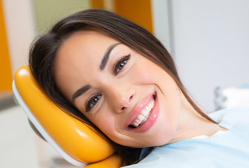 Smiling woman in dental chair