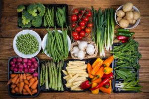 fresh vegetables neatly arranged on a table