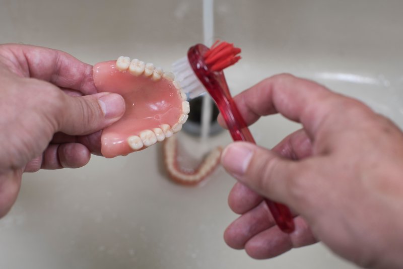 Cleaning Dentures McMinnville Can You Brush Dentures in Your Mouth?