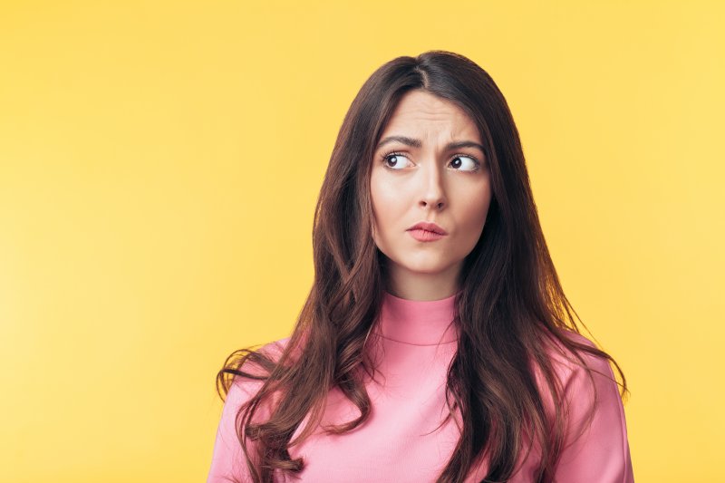 Woman with anxious questioning expression.